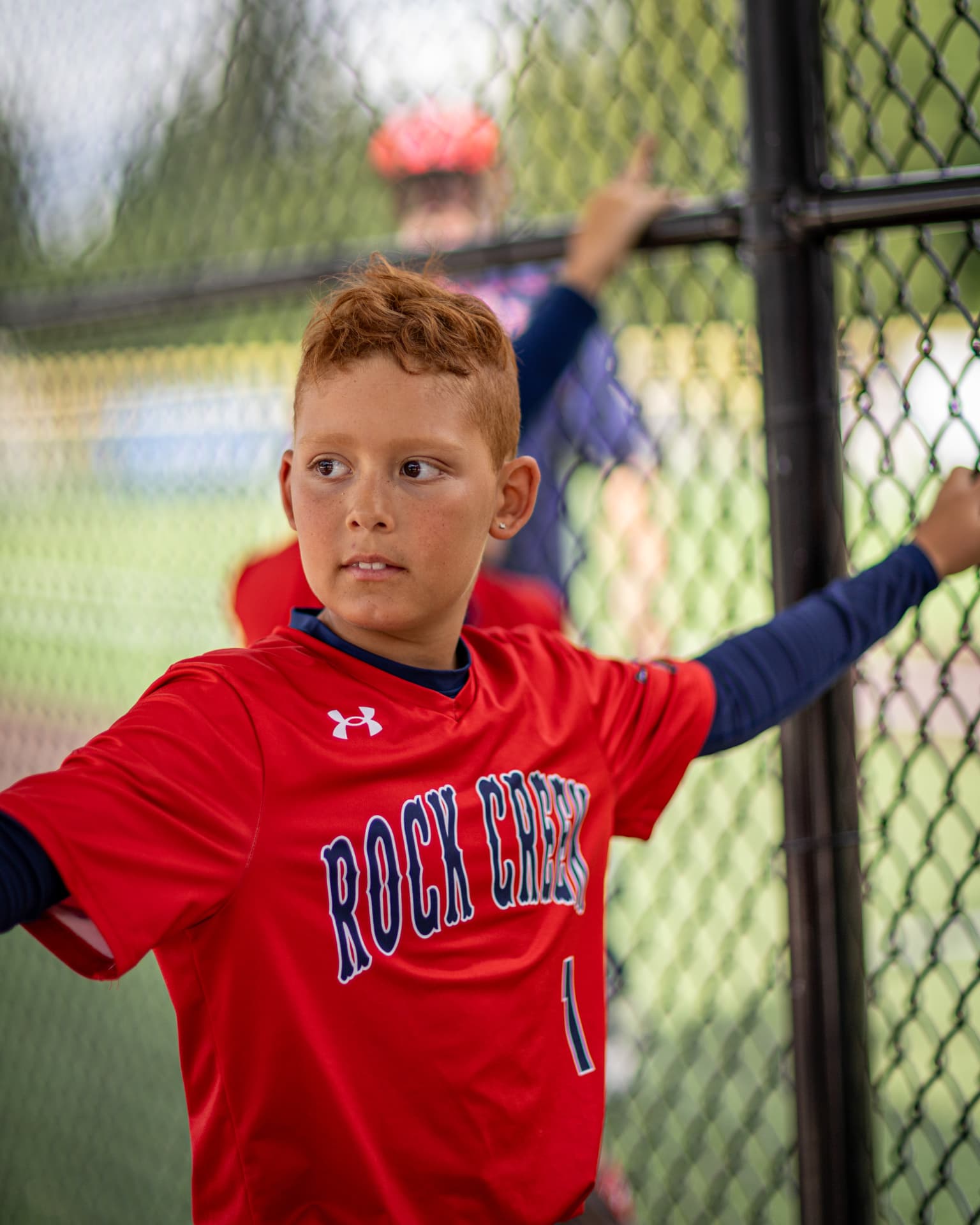 Kade in the dugout during a game