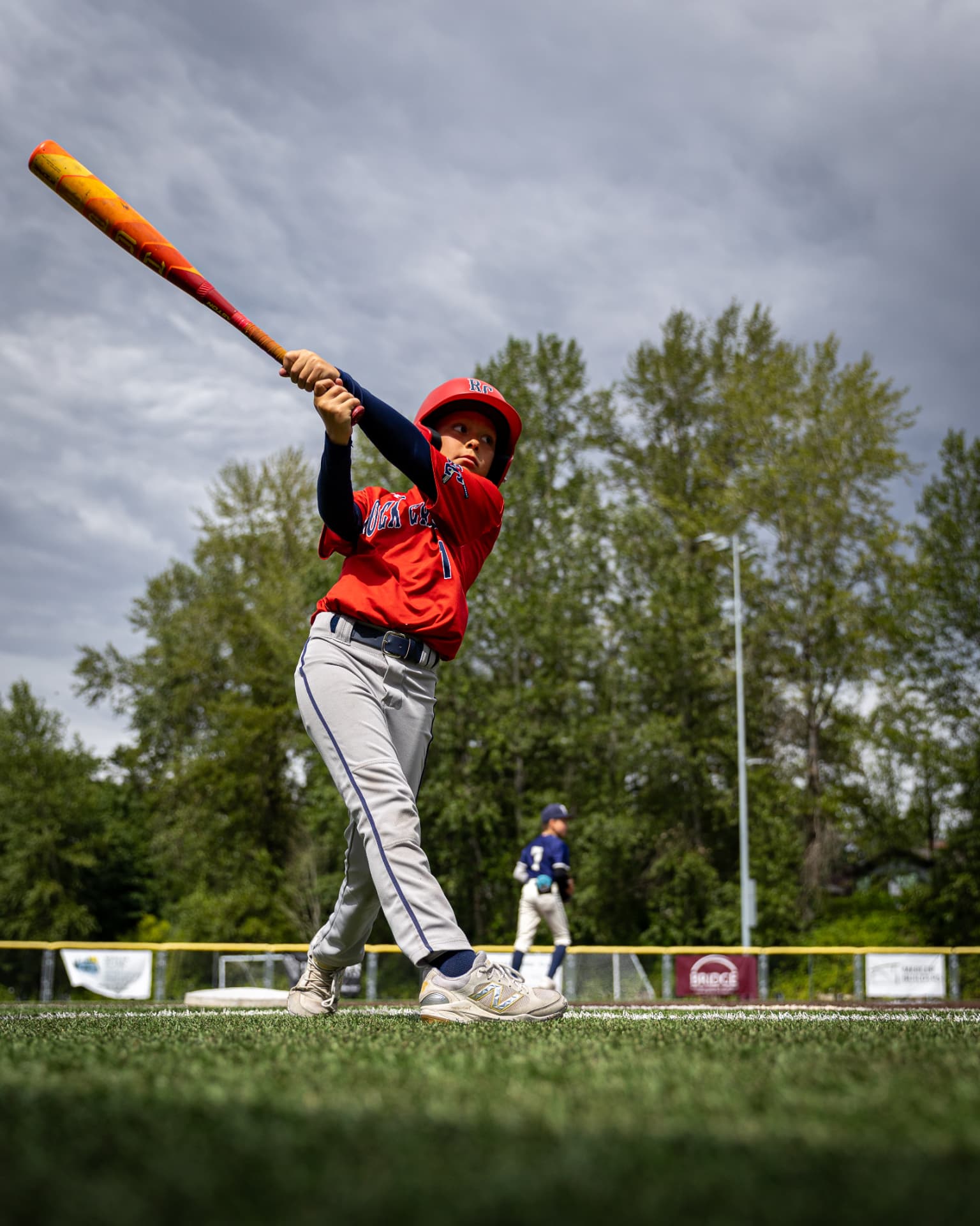 Kade Dickson finishing a swing at the plate