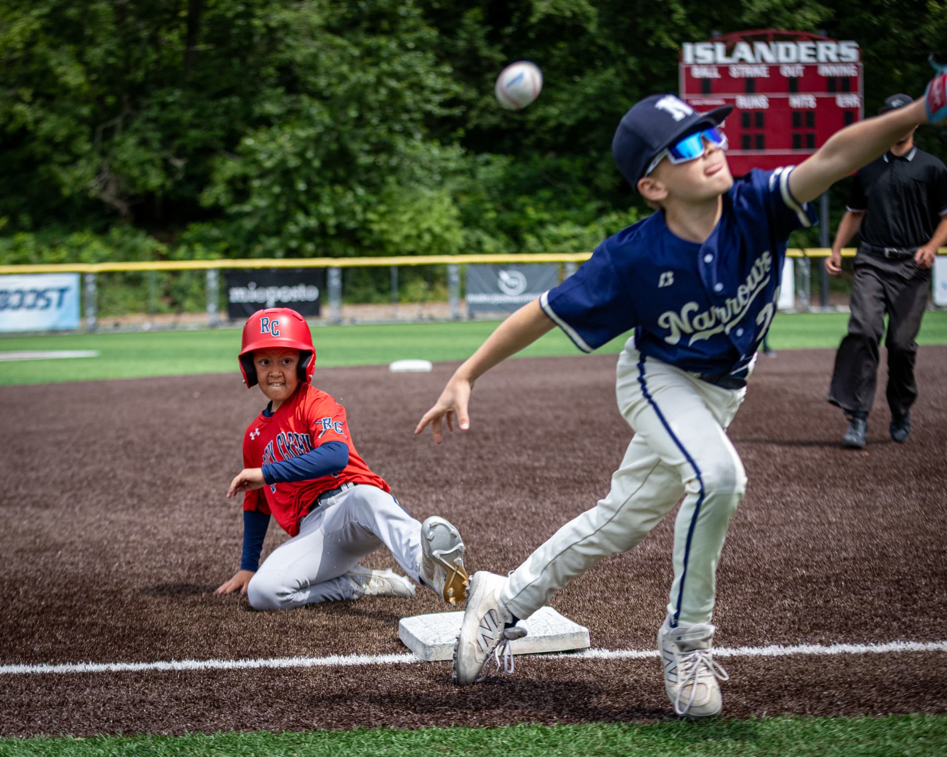 Kade sliding into third base